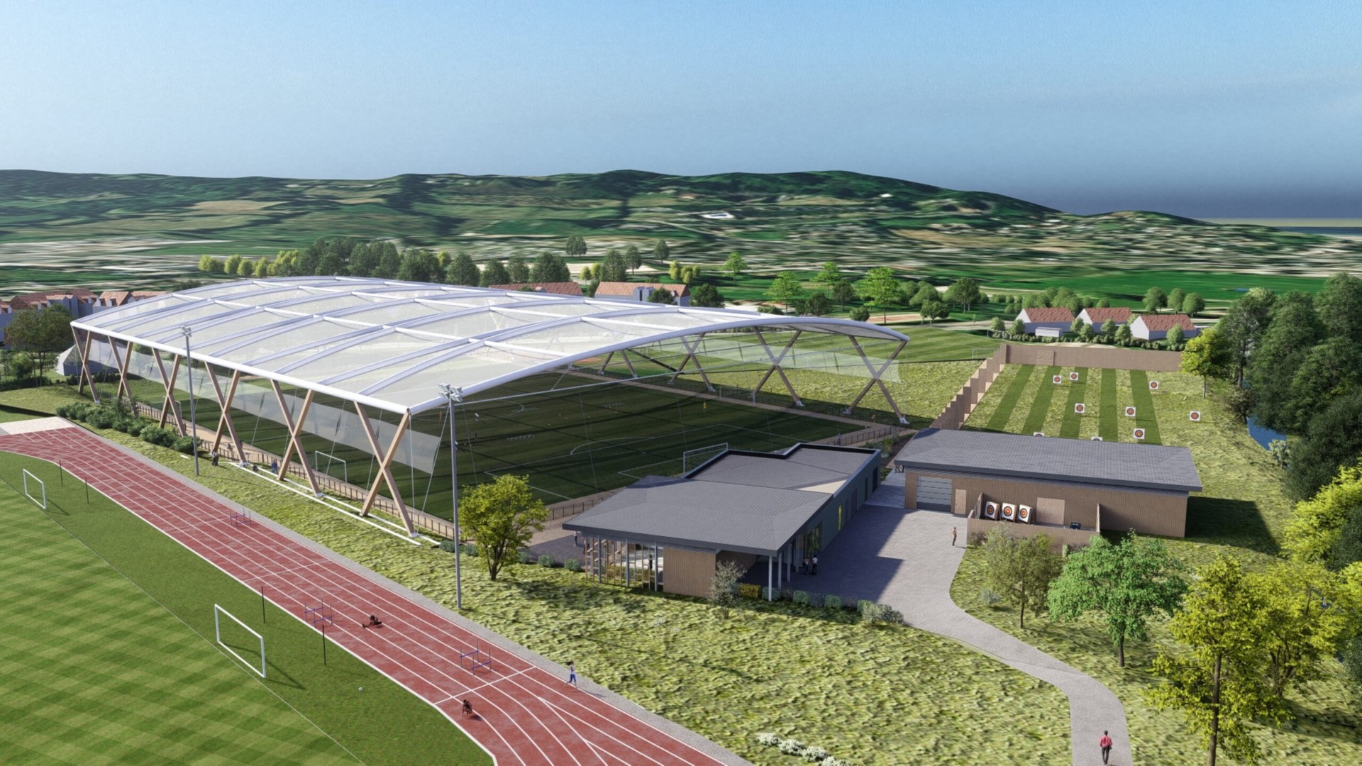 Vue aérienne du Centre Sportif de Normandie, halle sportive, piste d'athlétisme et campagne normande